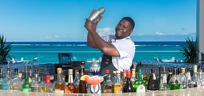 Bartender at Pelago mixing a cocktail